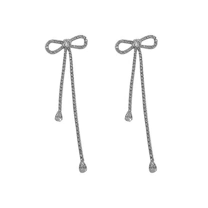 Long Bow Earrings with Zircon Inlaid Diamonds - Silver