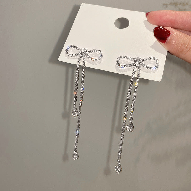 Long Bow Earrings with Zircon Inlaid Diamonds -